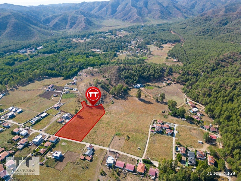 Tt emlak marmari̇s deği̇rmenyani satilik 9.575 m2 tarla