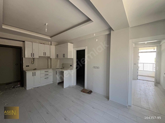ASEN GAYRİMENKULDEN GÜZELYURTTA SATILIK İÇİ YAPILI 1+1 DAİRE - Görsel 1