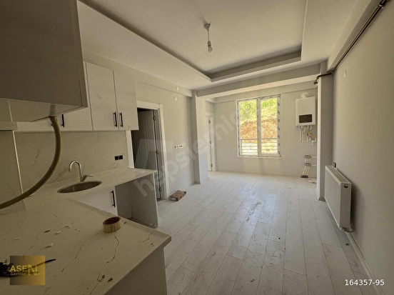 ASEN GAYRİMENKULDEN GÜZELYURTTA SATILIK İÇİ YAPILI 1+1 DAİRE - Görsel 3
