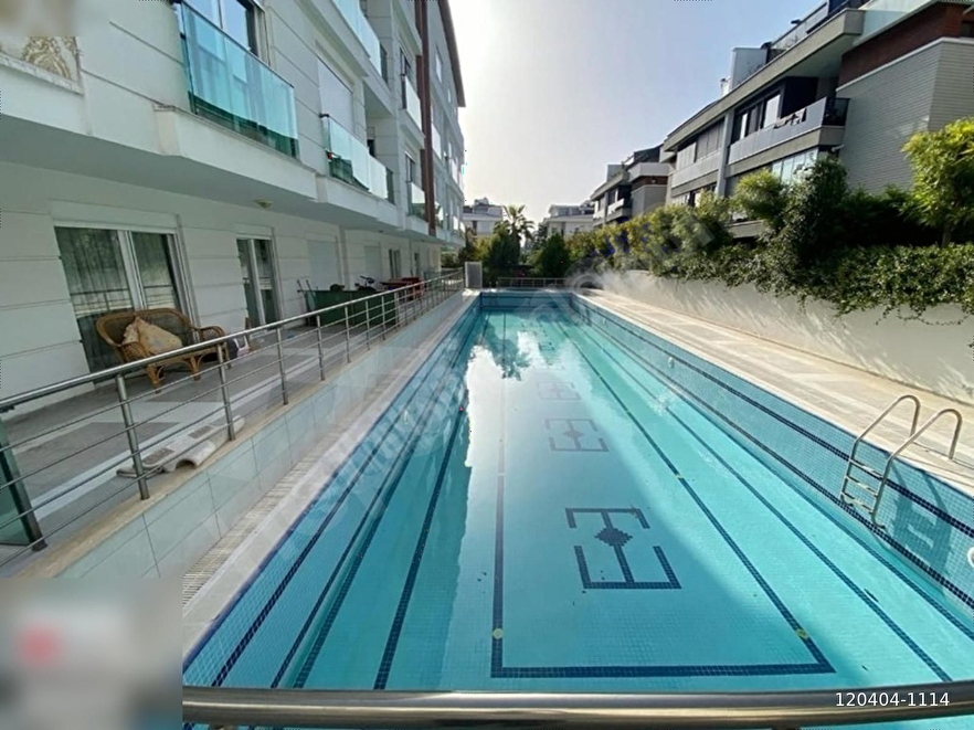 GÜZELOBA'DA SİTE İÇERİSİNDE, HAVUZLU SATILIK 1+1 ARA KAT DAİRE