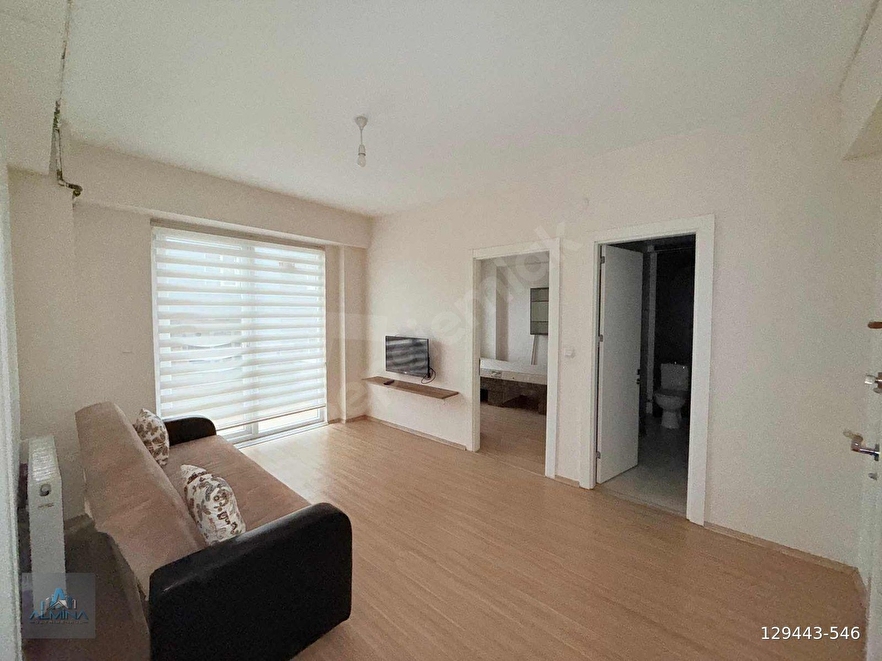 ALMİNA'DAN ANA CADDEYE YÜRME MESAFESİNDE YATIRIMLIK DAİRE