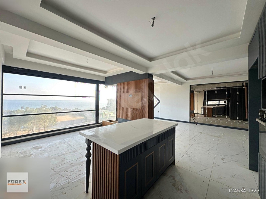 FOREXTEN PENCERESİ YEŞİLE VE MAVİYE AÇILAN DENİZE SIFIR LÜX 4+1