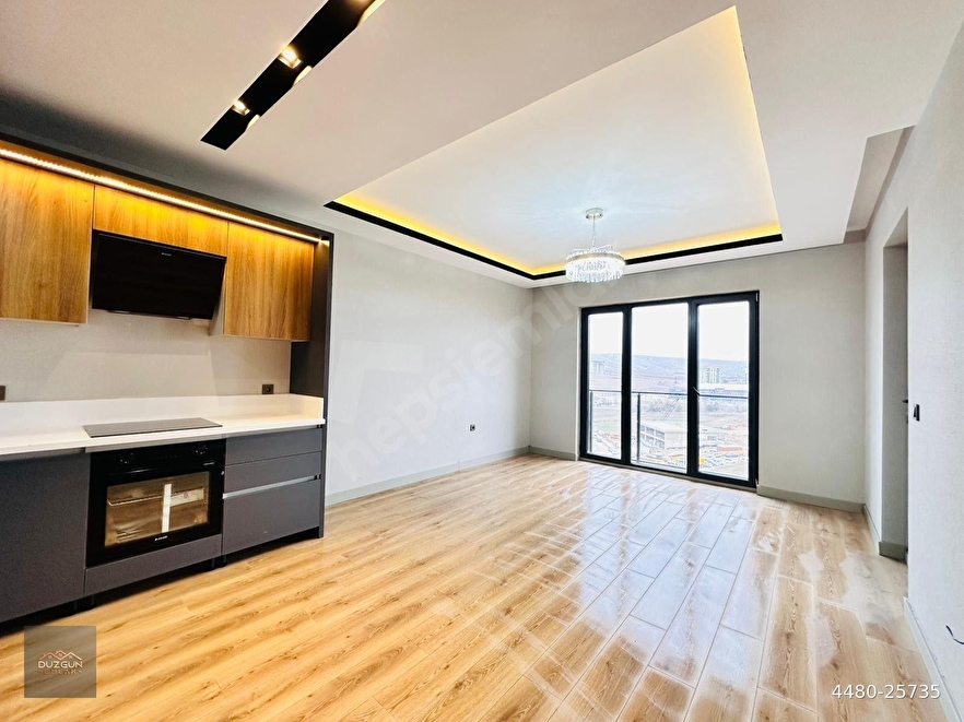 DÜZGÜN EMLAK'TAN FATİH MAH. LÜX VE MODERN TASARIMLI 2+1 FULL YAPILI DAİRE