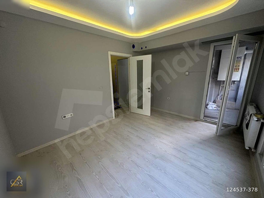 BOZYAKA KAPALI PAZARYERİ YAKINI 115 M2 BAHÇELİ SATILIK DAİRE