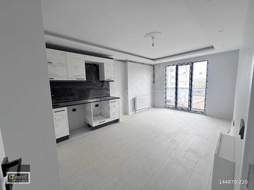 ATATÜRK MAHALLESİNDE 2+1 ASANSÖRLÜ ARA KAT AMERİKAN MUTFAK