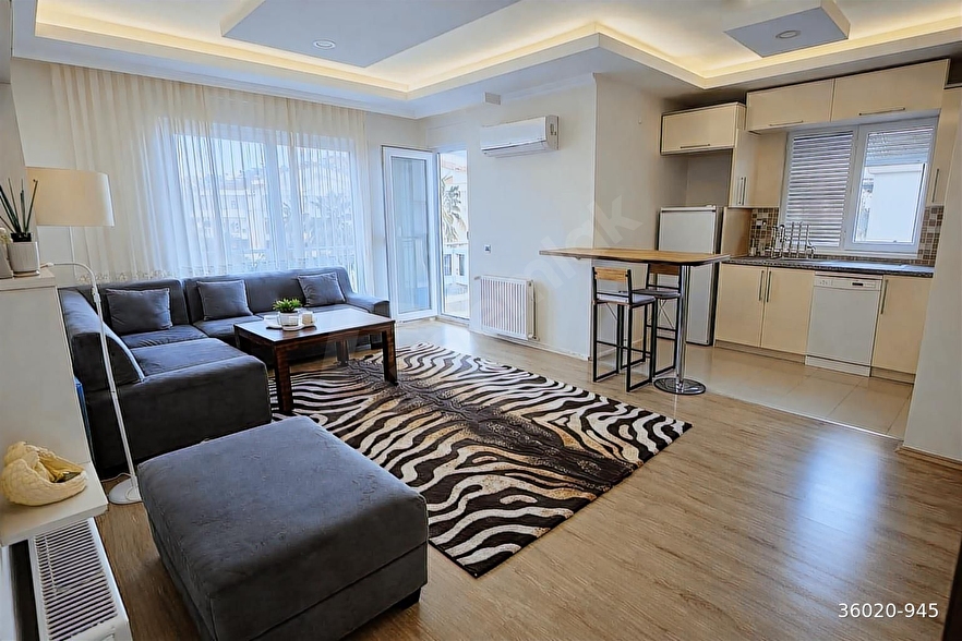 KONYAALTI HURMADA HAVUZLU SİTEDE 4.KAT ÖNÜ AÇIK GÜNEŞLİ 1+1