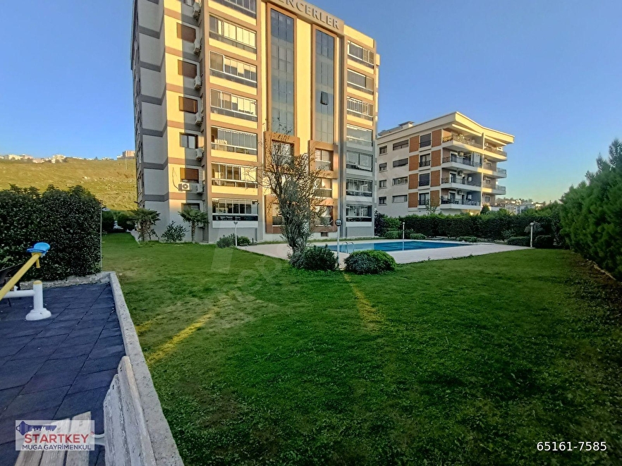 MUGA'DAN BALATÇIK GENCERLER SİTESİNDE,ÖNÜ AÇIK,YÜZME HAVUZLU,SİTE İÇERİSİNDE SATILIK 3+1 DAİRE